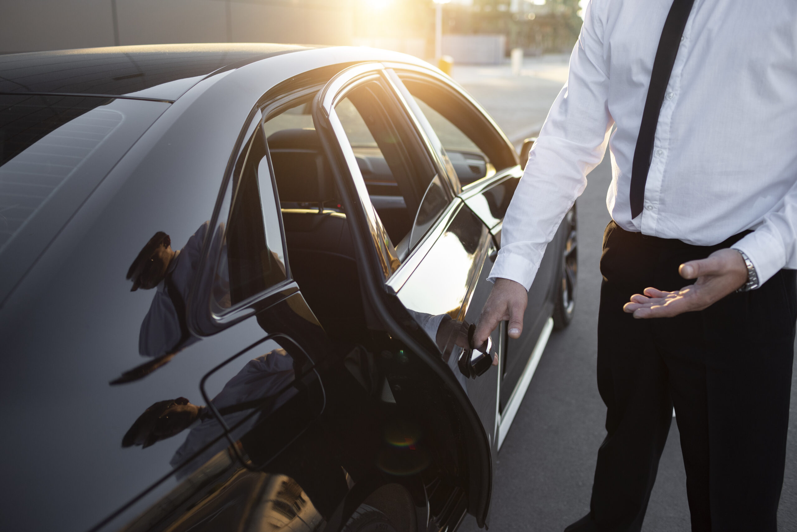 driver-with-opened-car-door